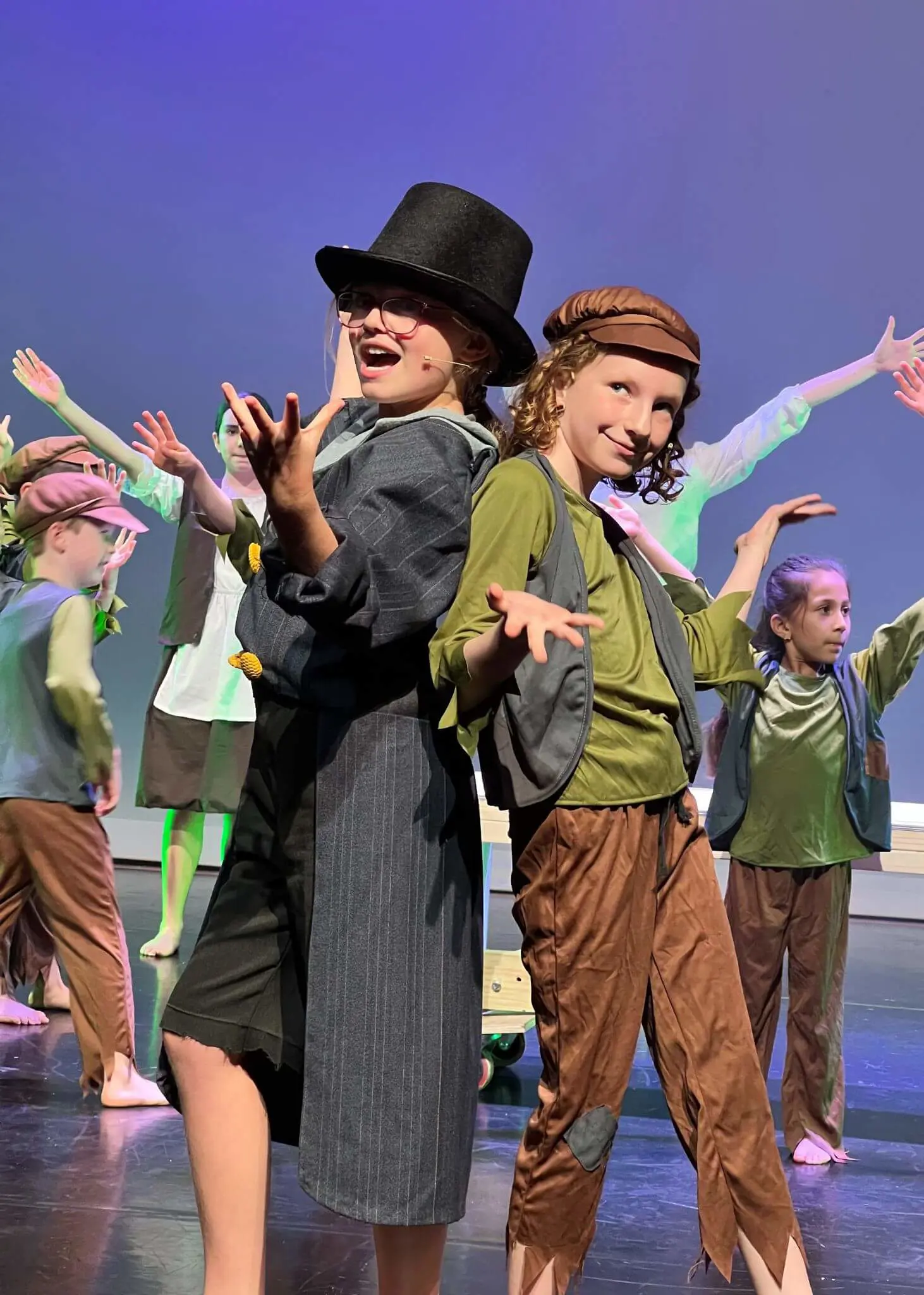 Prep pupils performing a play at Ibstock Place School, a private school near Richmond, Barnes, Putney, Kingston, and Wandsworth on an overseas trip. 