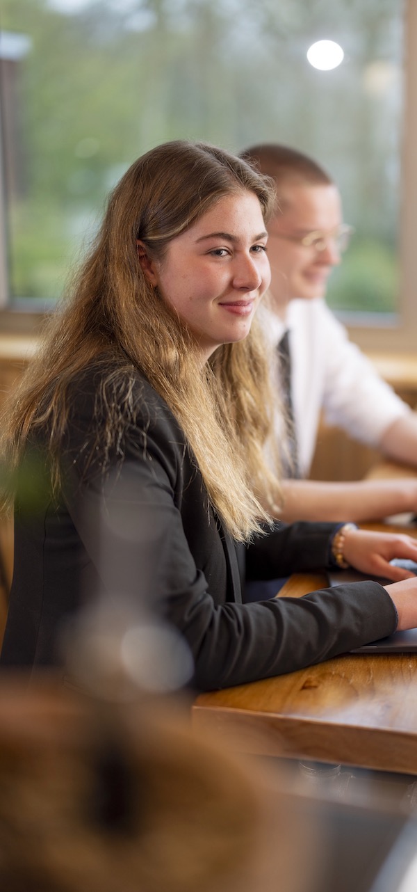 AN image of a senior pupil in the class.