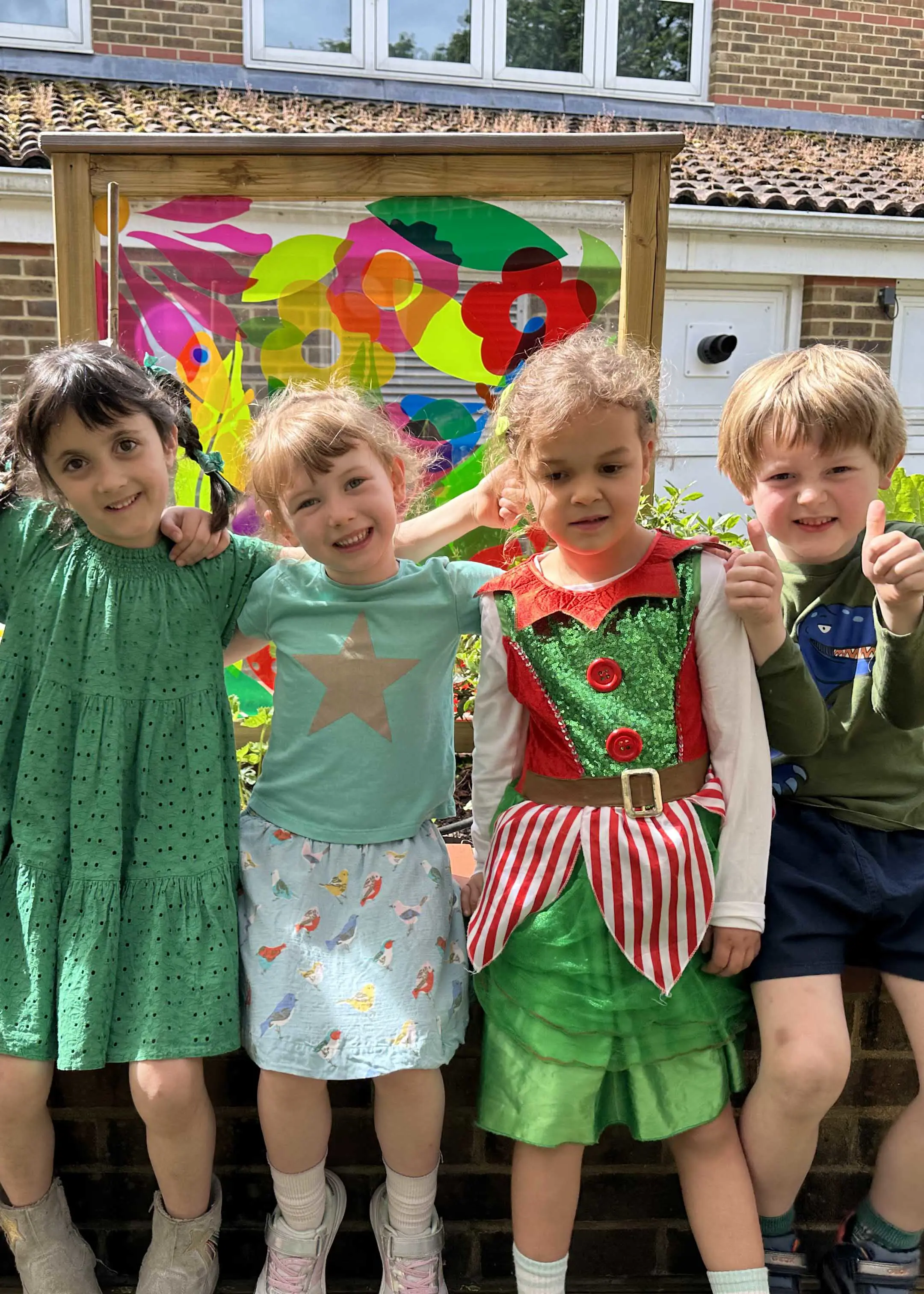 Prep pupils wearing green for Mental Health Awareness week at Ibstock Place School, a private school near Richmond, Barnes, Putney, Kingston, and Wandsworth on an overseas trip. 
