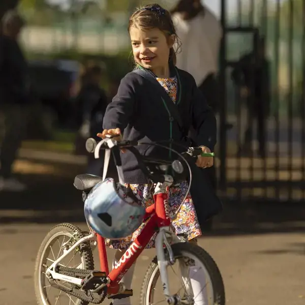 prep pupils arriving at the school on their cycle.