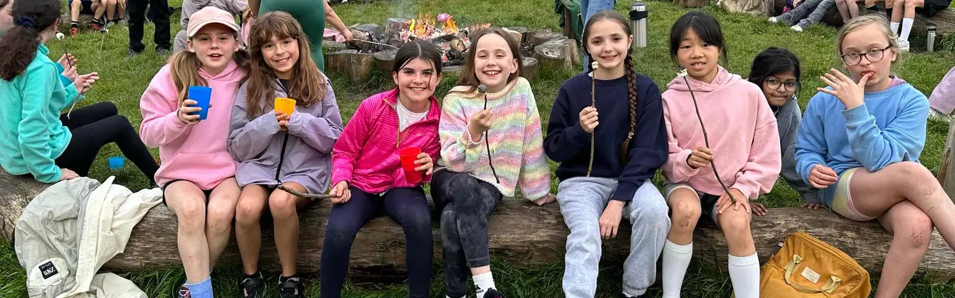 Prep pupils enjoying a camp fire| Ibstock Place School, a private school near Richmond, Barnes, Putney, Kingston, and Wandsworth.
