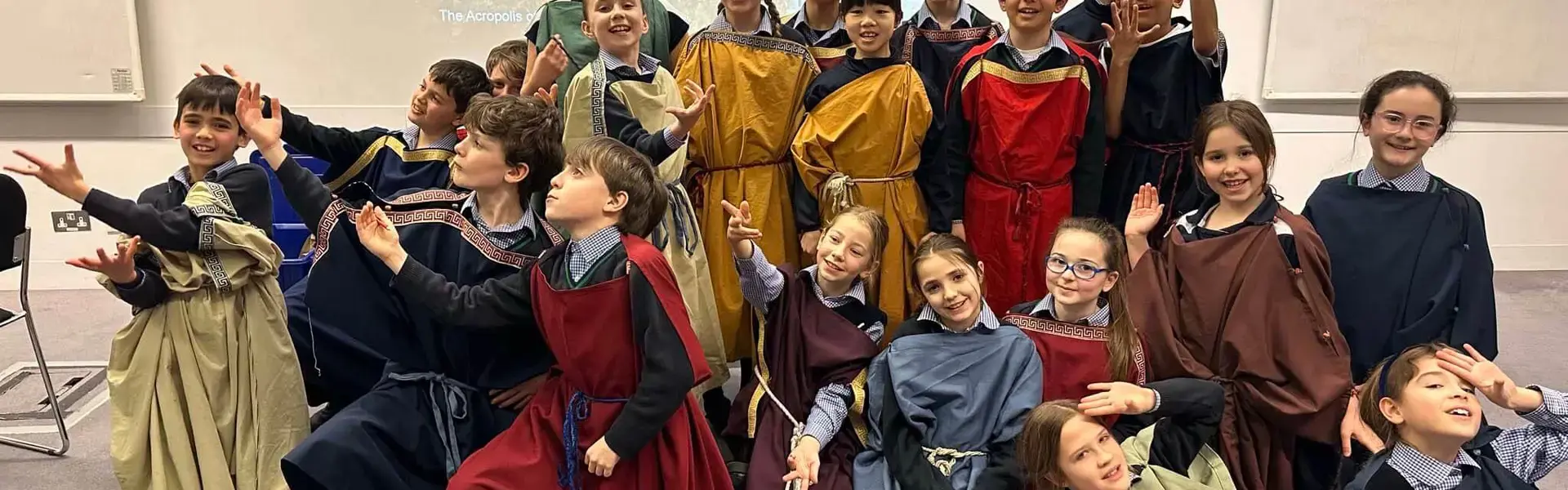 Prep 5 pupils at the British Museum wearing ancient costumes at Ibstock Place School, a private school near Richmond, Barnes, Putney, Kingston, and Wandsworth.