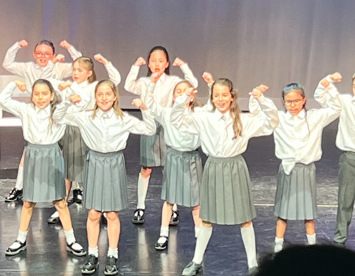 Prep girls doing a dance performance at Ibstock Place School, a private school near Richmond.
