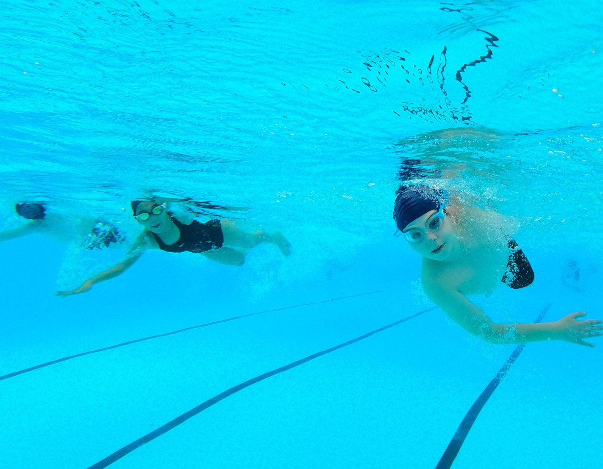 Underwater image of the prep pupils swimming at Ibstock Place School, a private school near Richmond.