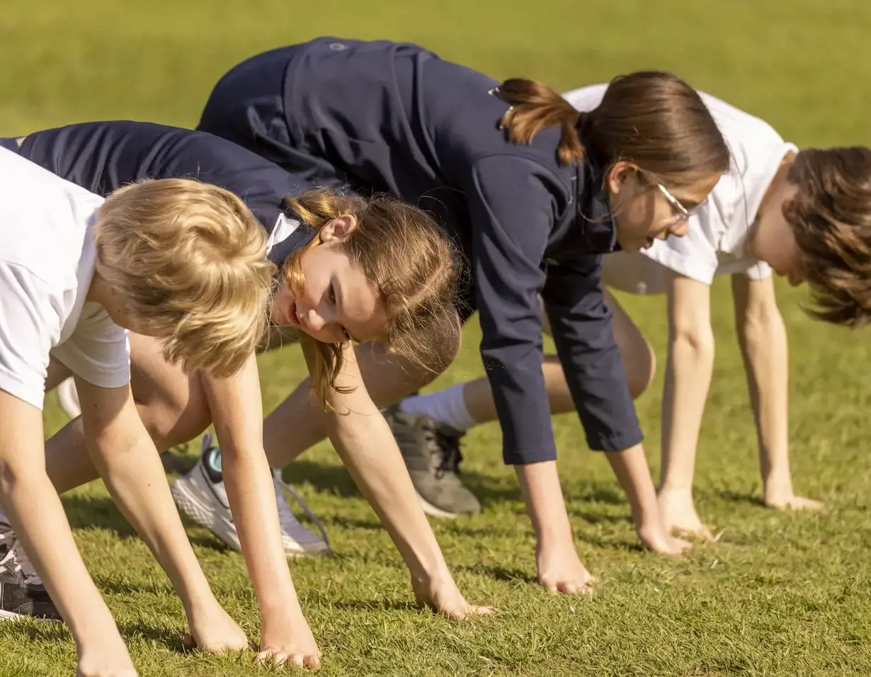 Prep pupils running for sports day at Ibstock Place School, a private school near Richmond.