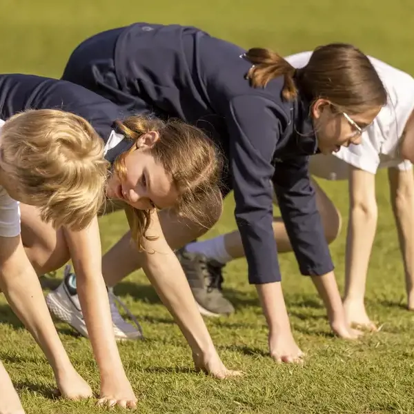 Prep pupils running at sports day at Ibstock Place School, a private school near Richmond.