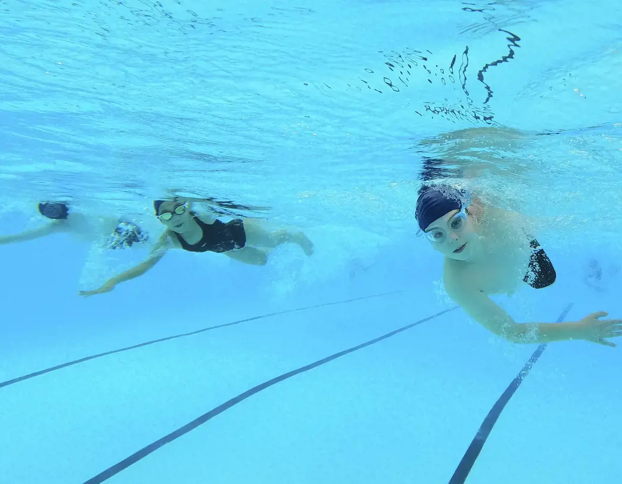 Prep pupils doing underwater swimming at Ibstock Place School, Near Richmond.