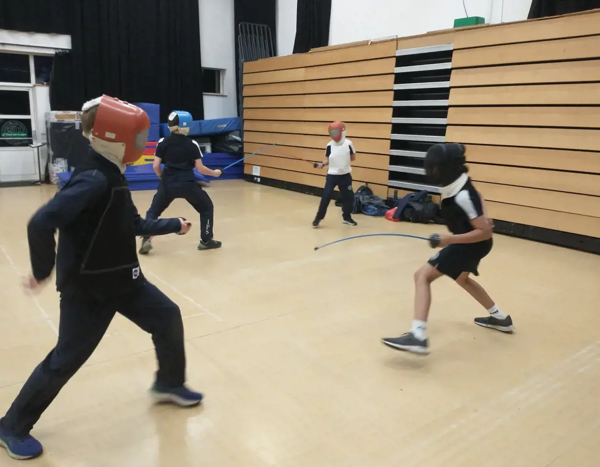 Senior pupils playing fencing at Ibstock Place School , a private school near Richmond, Barnes, Putney, Kingston, and Wandsworth
