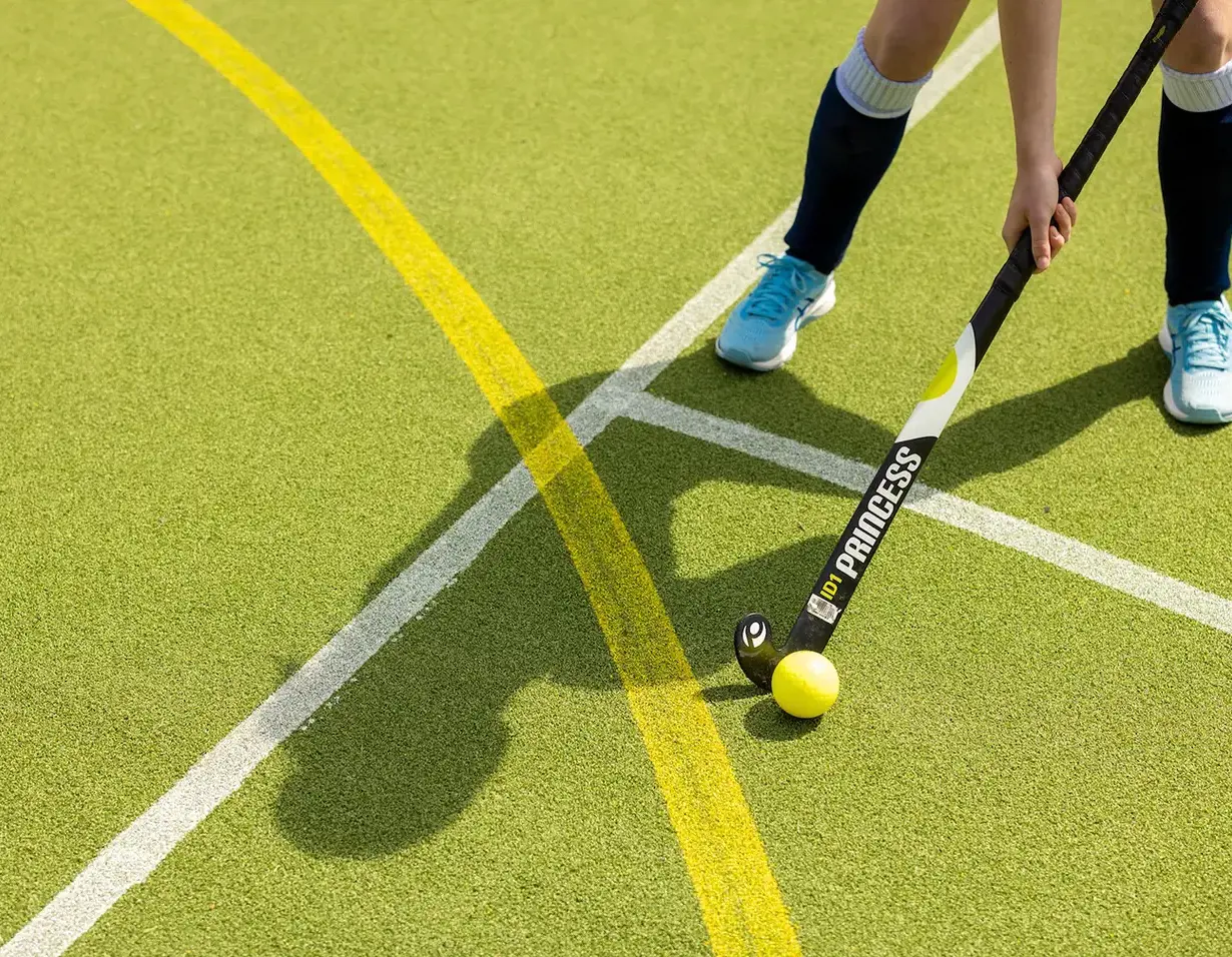 Senior pupils playing hockey at Ibstock Place School, a private school near Richmond, Barnes, Putney, Kingston, and Wandsworth.