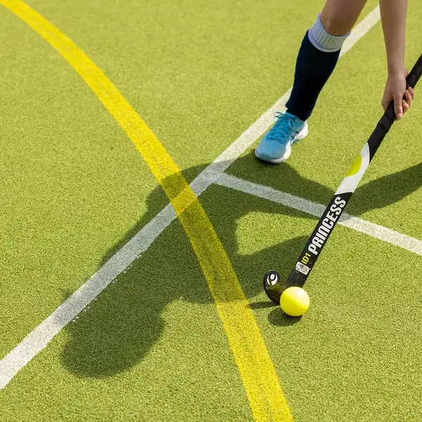 Sixth form pupils playing hockey at Ibstock Place School, a private school near Richmond, Barnes, Putney, Kingston, and Wandsworth.