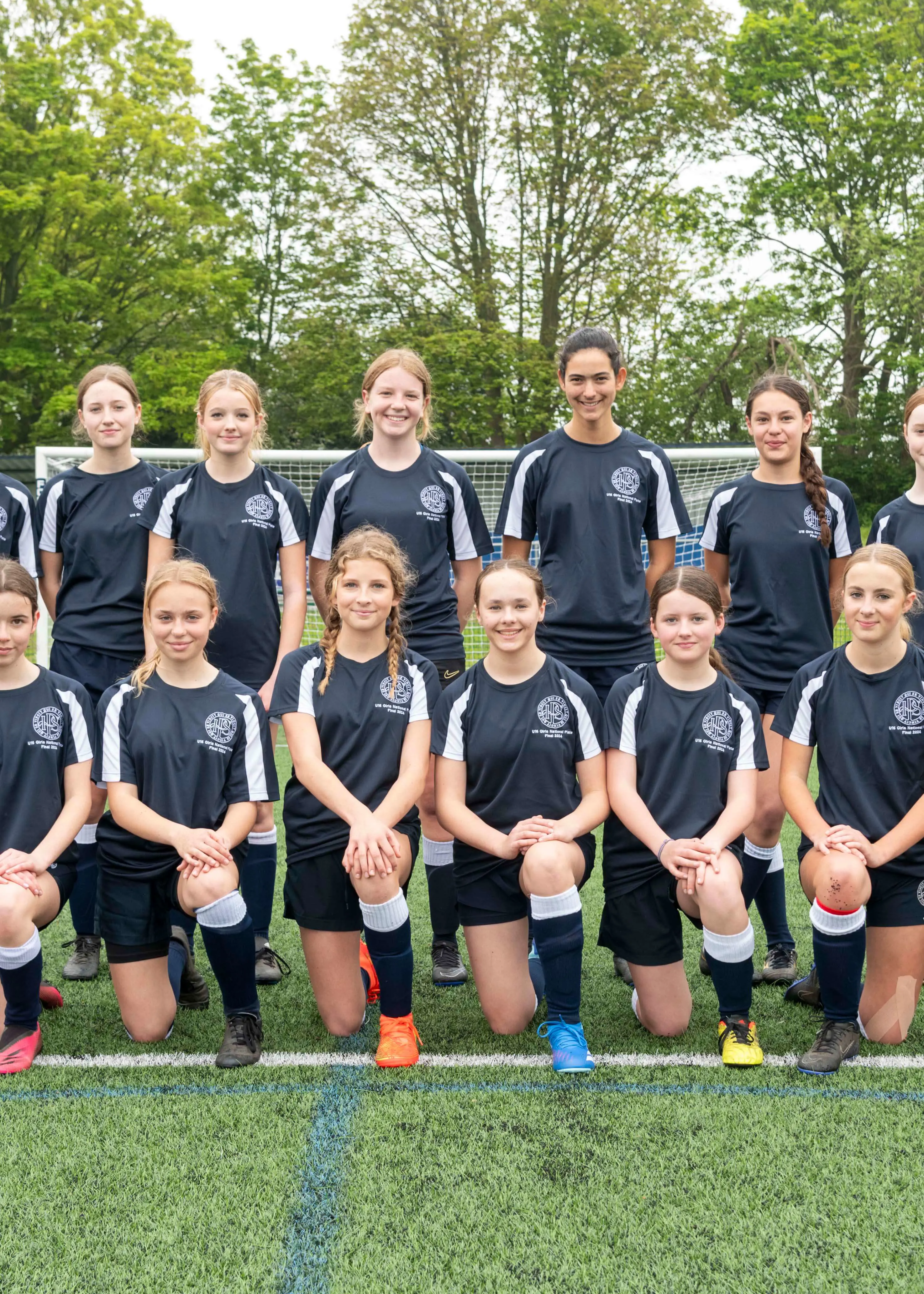 Team photo of U15 girls football team of Ibstock Place School, a private school near Richmond, Barnes, Putney, Kingston, and Wandsworth.