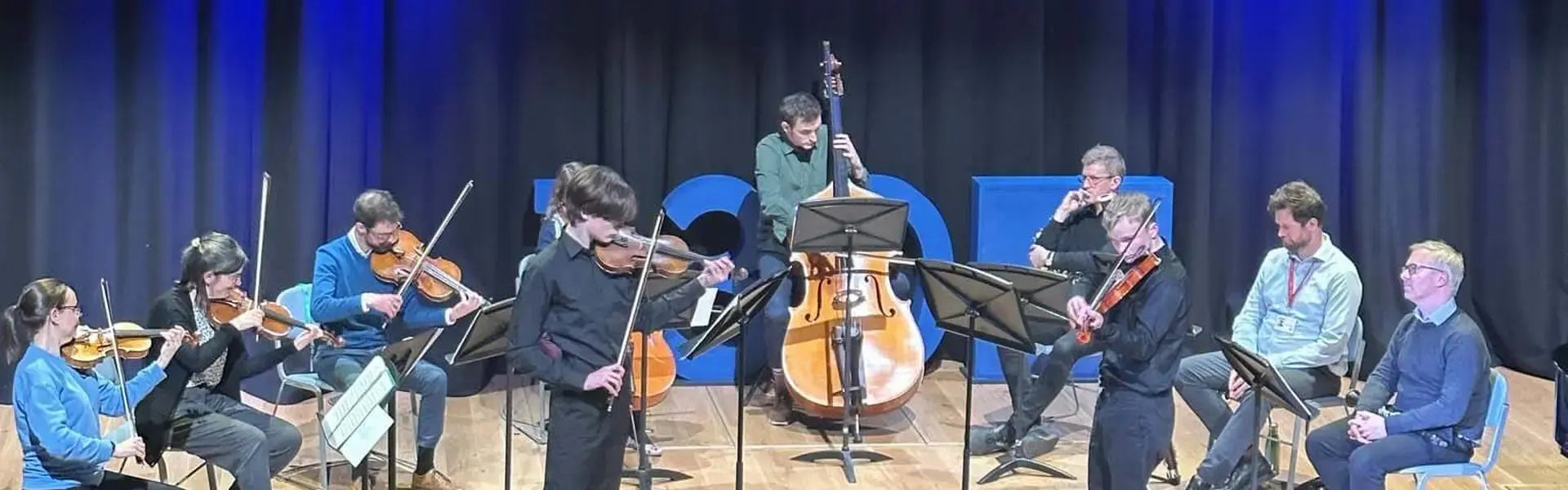 The music scholars playing music with our professional ensemble-in-residence ‘The Berkeley Ensemble' at Ibstock Place School, a private school near Richmond, Barnes, Putney, Kingston, and Wandsworth.