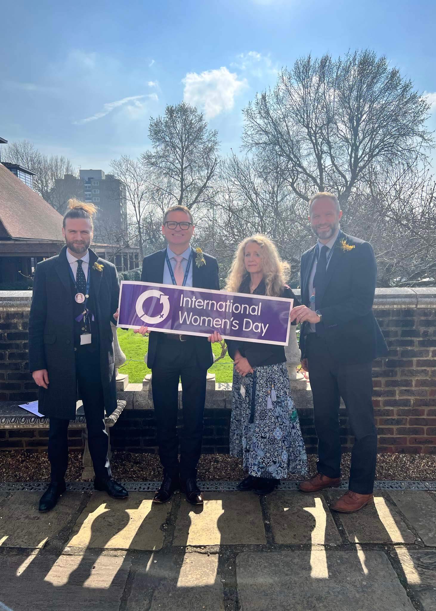 Staff celebrating International Women's Day at Ibstock Place School, Roehampton, a private school near Richmond, Barnes, Putney, Kingston, & Wandsworth