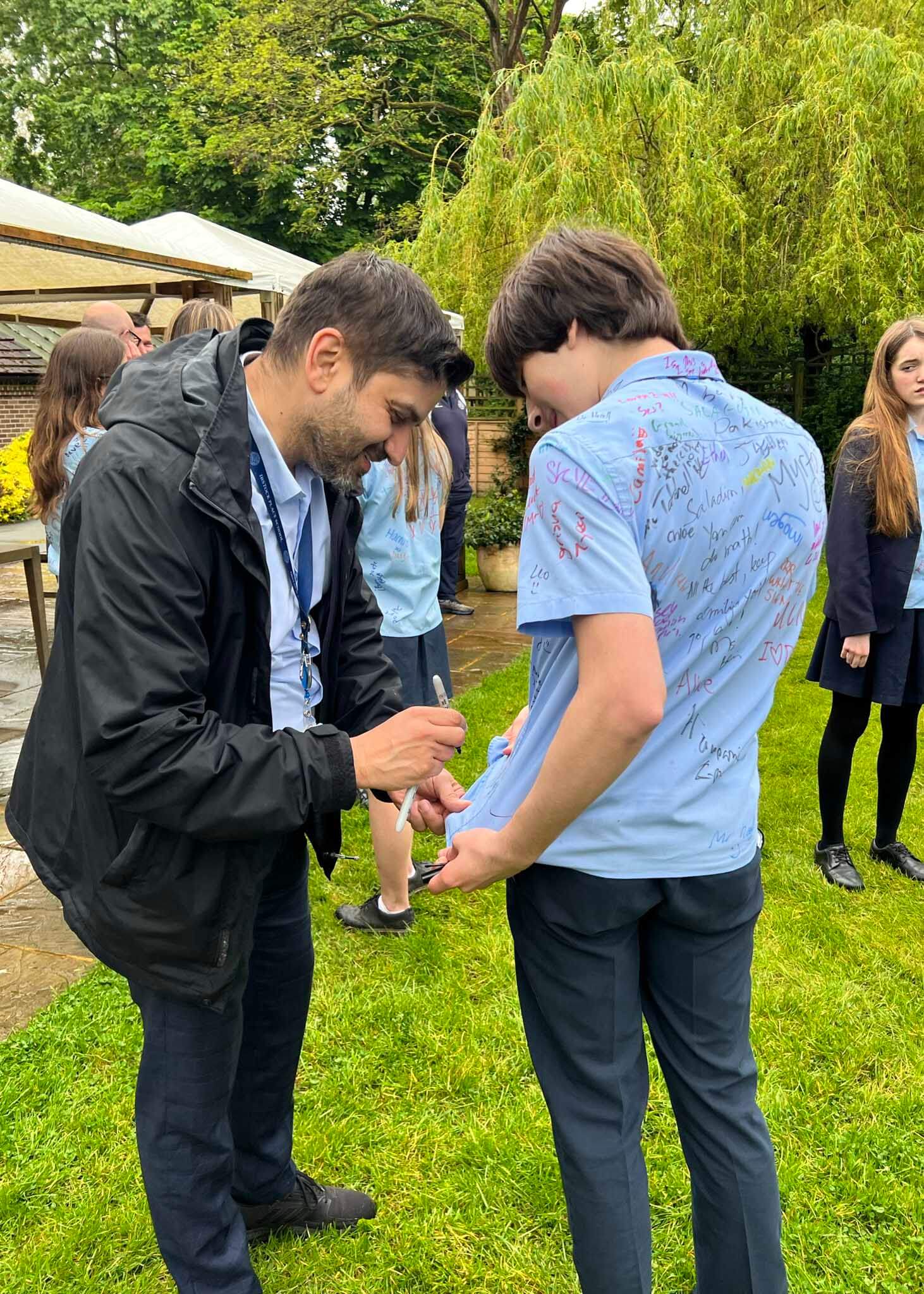 Senior 11 pupils with their teacher on their last day at  Ibstock Place School, a private school near Richmond, Barnes, Putney, Kingston, and Wandsworth on an overseas trip. 