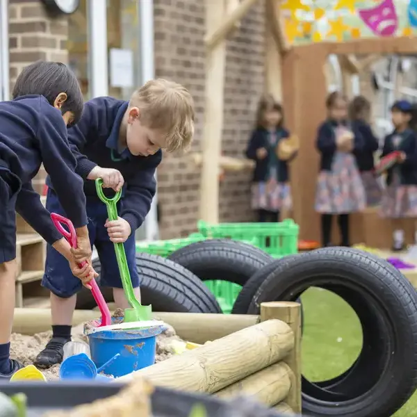 prep pupils playing in the playground of Ibstock Place School, a private school near Richmond.