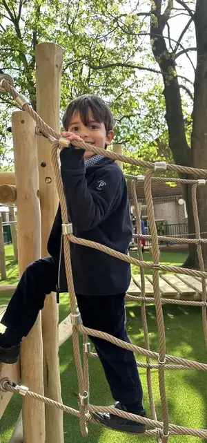 Pre-Prep pupils playing in the playground at Ibstock Place School, a private school near Richmond, Barnes, Wandsworth.