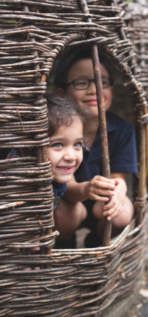 Prep pupils playing around and smiling.