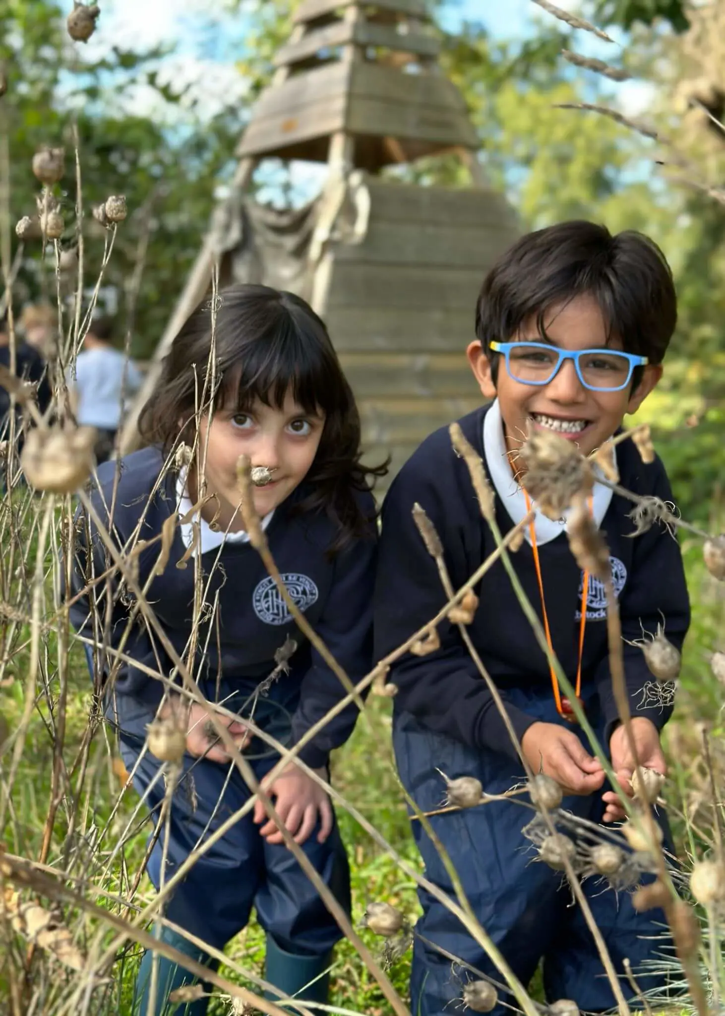 Pre-prep pupils playing with conkers, Ibstock Place School a private school near Richmond, Barnes, Putney, Kingston, and Wandsworth.