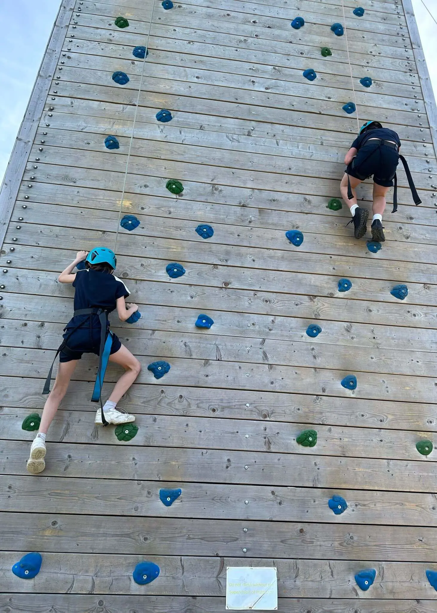 Prep 6 residential trip to the Isle of Wight, pupils in climbing gear| Ibstock Place School, Roehampton, Private School Near Richmond, Barnes, Putney, Kingston, & Wandsworth 