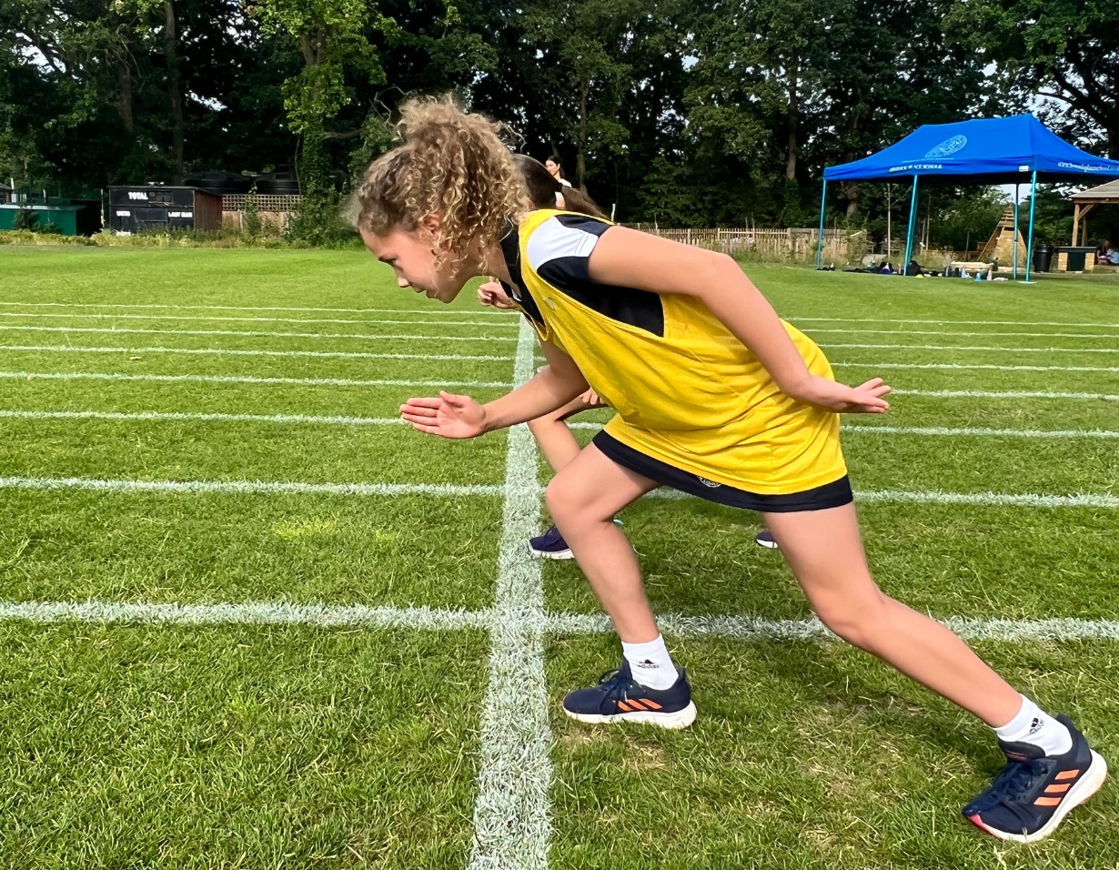 Prep pupils running at sports day at Ibstock Place School, a private school near Richmond.