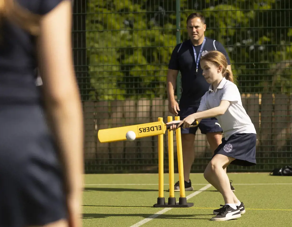 prep pupils playing cricket at Ibstock Place School, a private school near Richmond.