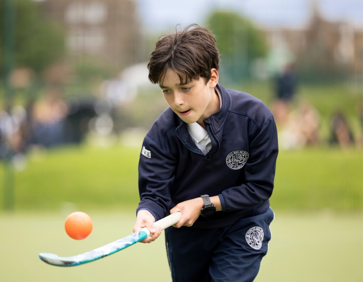 Prep pupils playing hockey at Ibstock Place School, a private school near Richmond.