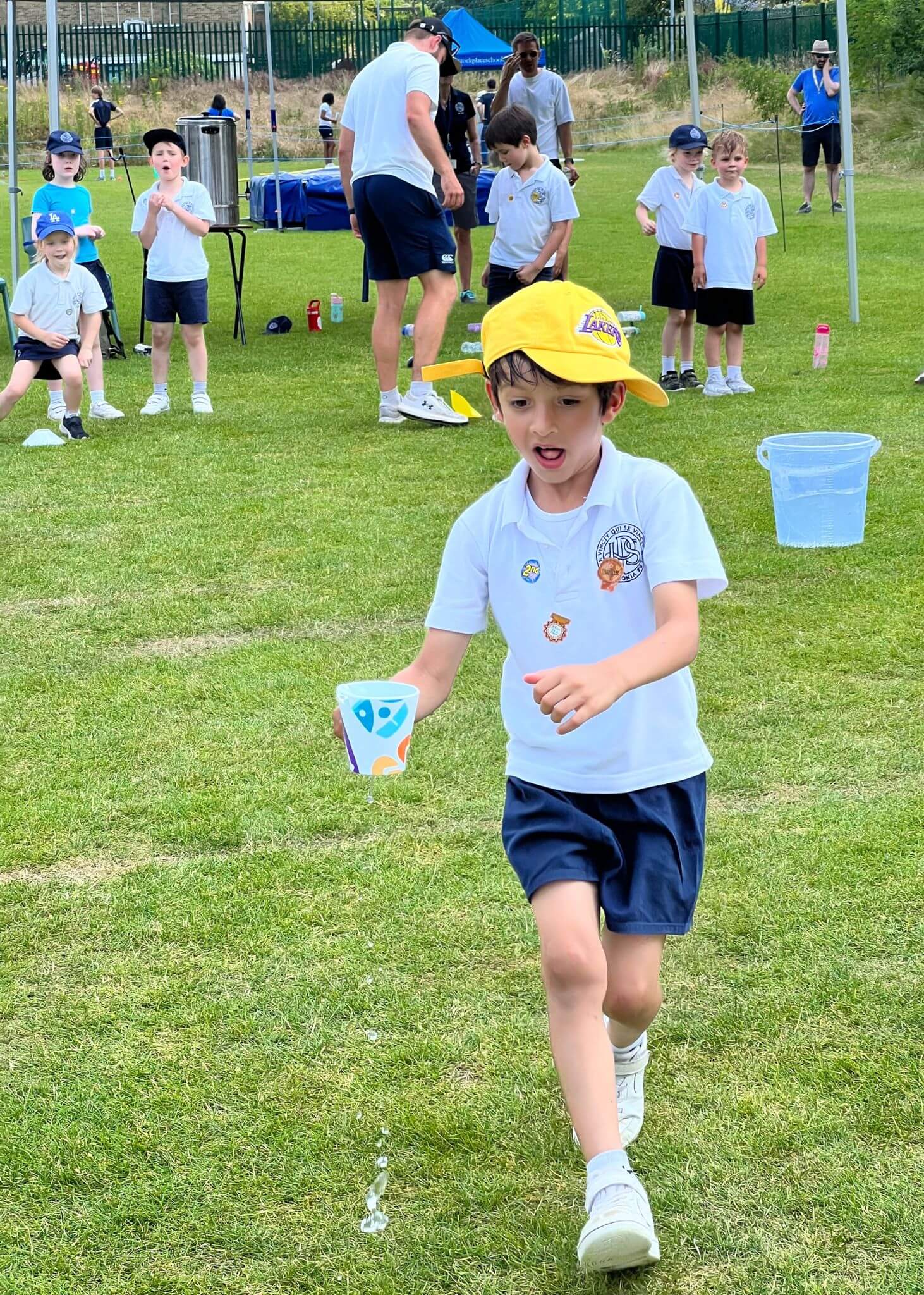 Prep pupil in a fun hurdle race | Ibstock Place School, Roehampton, Private School Near Richmond, Barnes, Putney, Kingston, & Wandsworth 