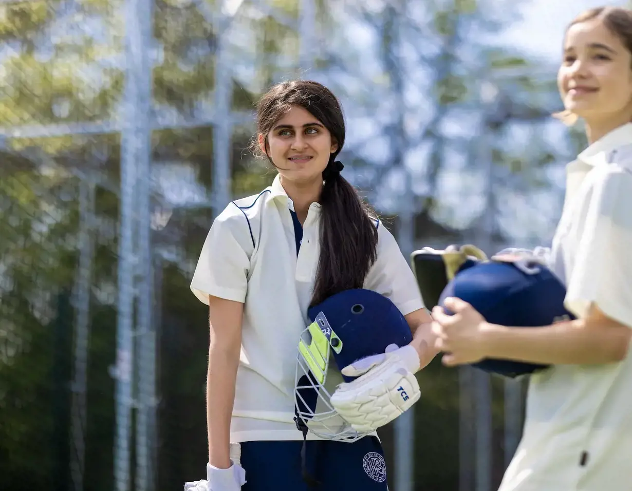 Senior pupils playing cricket at Ibstock Place School, a private school near Richmond, Barnes, Putney, Kingston, and Wandsworth.