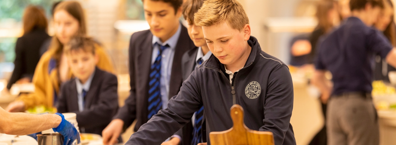 Senior pupils having lunch at Ibstock Place School, a private school near Richmond, Barnes, Putney, Kingston, and Wandsworth