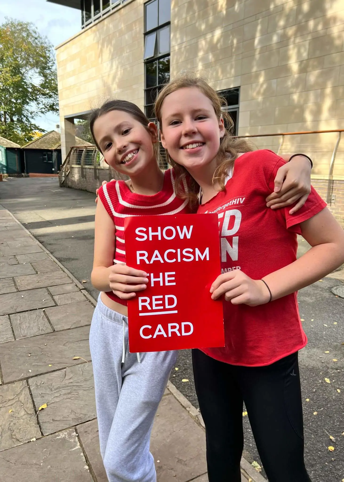 upils wearing red at Ibstock Place School, a private school near Richmond, Barnes, Putney, Kingston, and Wandsworth.