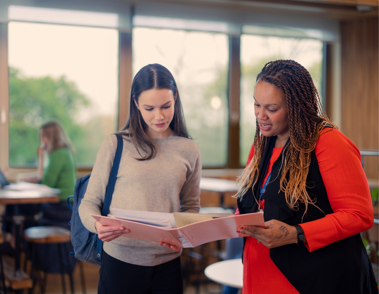 Sixth form pupil with a teacher of Ibstock Place School, a private school near Richmond, Barnes, Putney, Kingston, and Wandsworth.