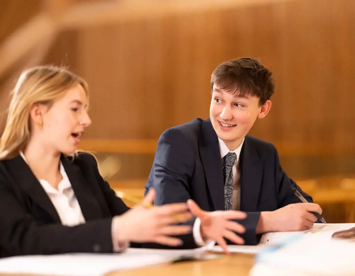 Sixth form pupils studying in the Great hall at Ibstock Place School, a private school near Richmond, Barnes, Putney, Kingston, and Wandsworth.