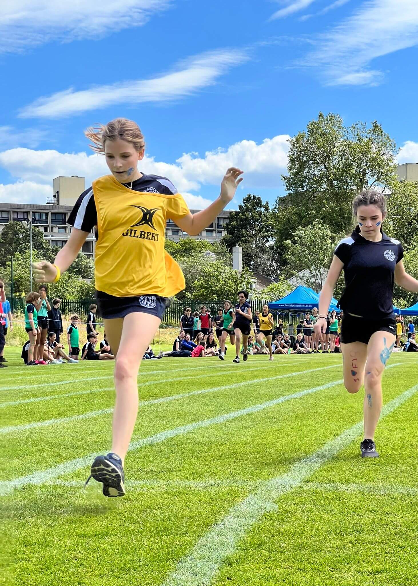 Track and Field Day, pupil at the finishing line | Ibstock Place School, Roehampton, Private School Near Richmond, Barnes, Putney, Kingston, & Wandsworth 