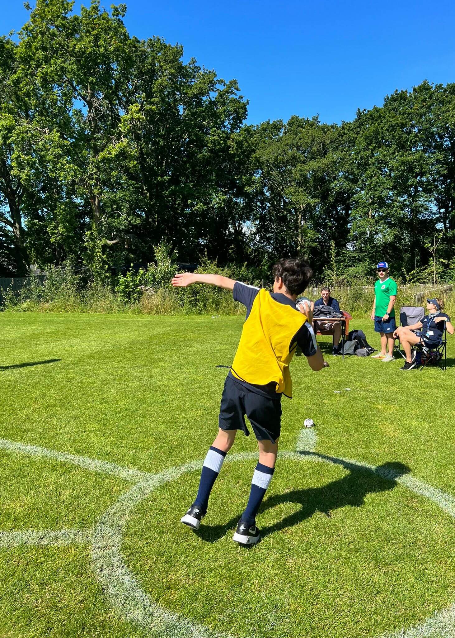 Track and Field Day, pupil doing a shot put | Ibstock Place School, Roehampton, Private School Near Richmond, Barnes, Putney, Kingston, & Wandsworth 